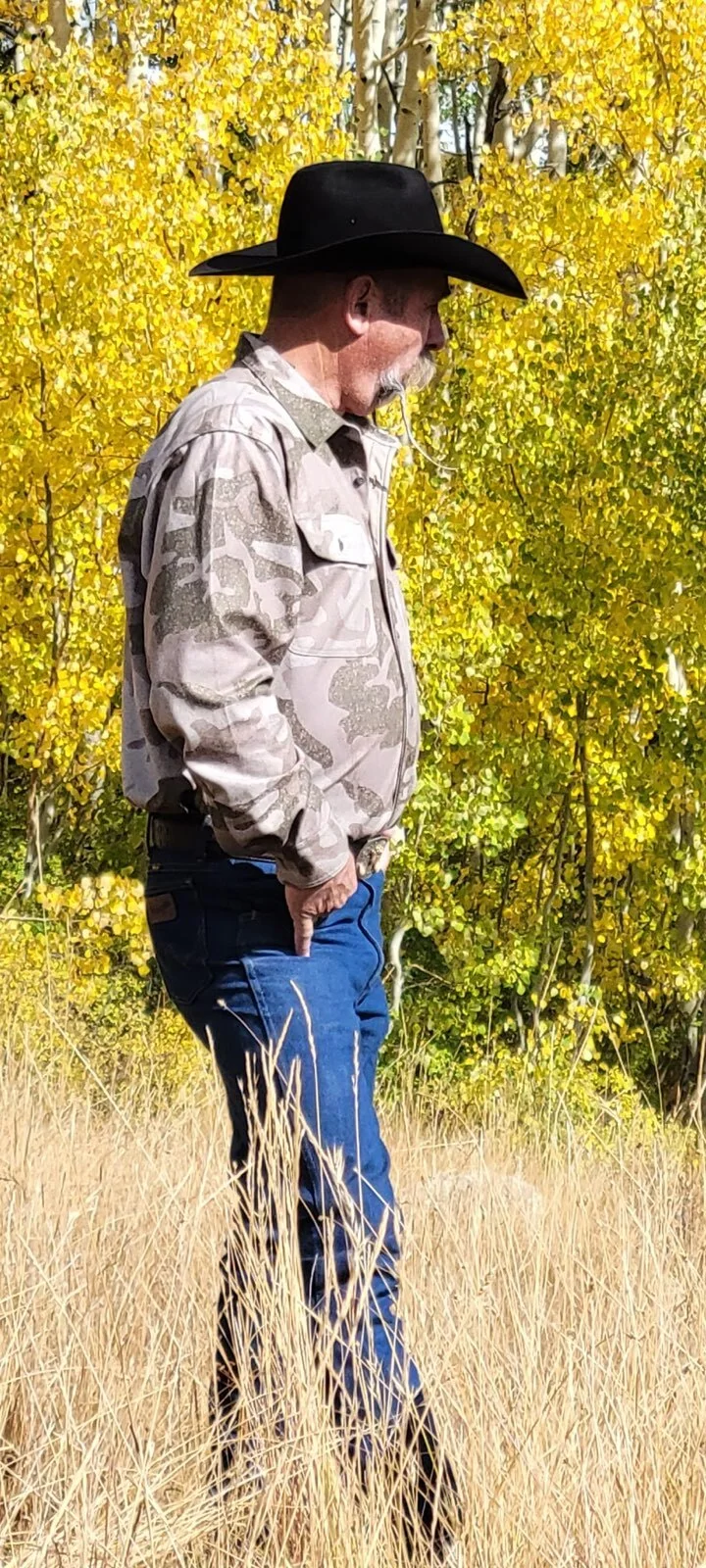 Kevin outdoors in a cowboy hat